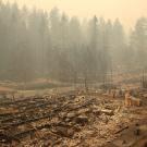 Image: after-effects of the air quality from California's Camp fire depicting lingering smoke and charred ground.